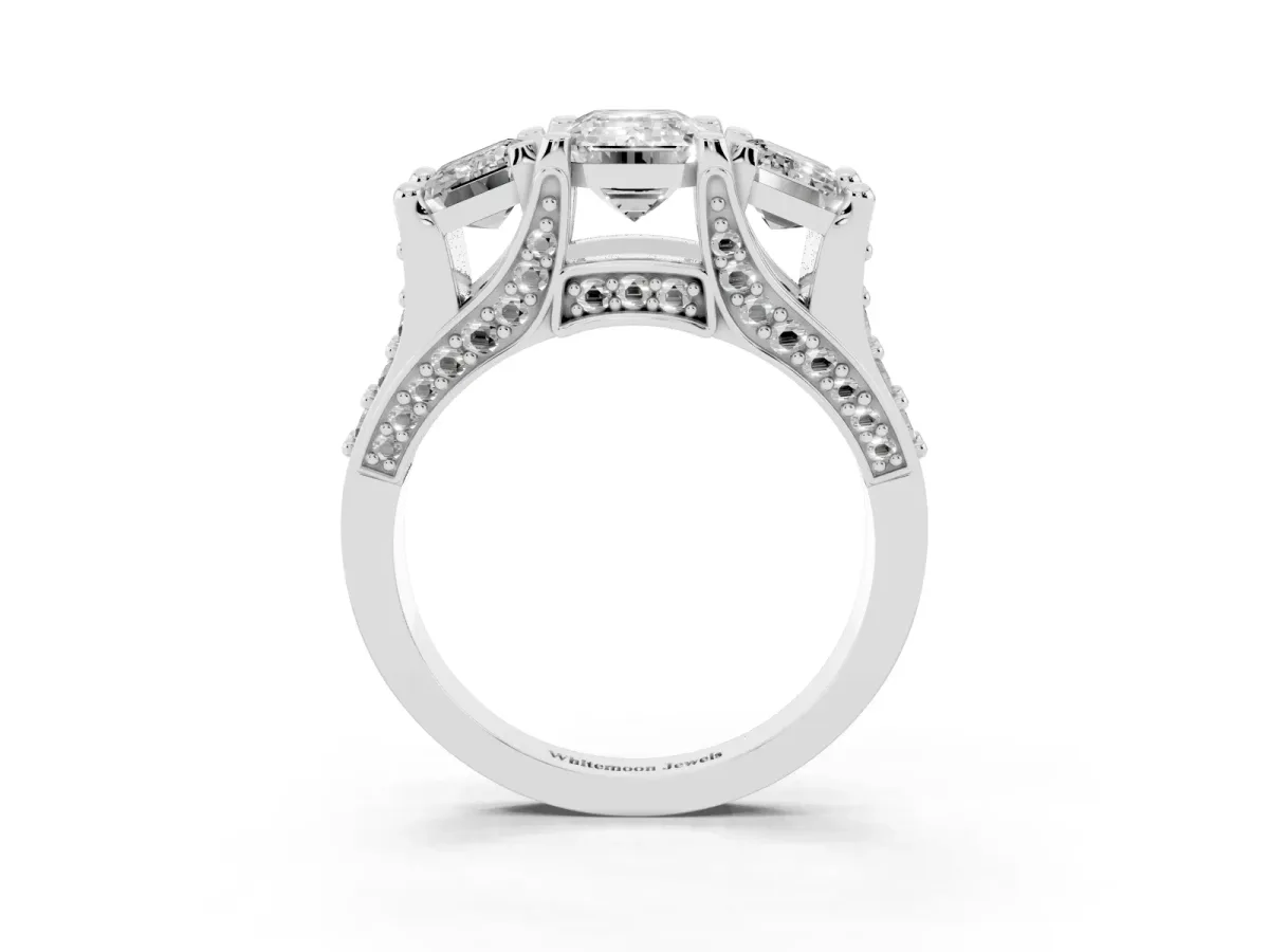 Emerald Cut Diamond Three-Stone Ring with Channel Set Band and Four-Prong Setting Silver