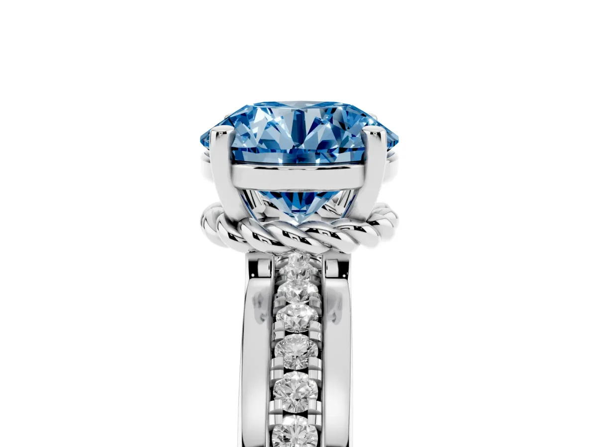 Fancy Blue Round Cut Solitaire Diamond Ring with Channel Set Band and Six-Prong Setting Silver