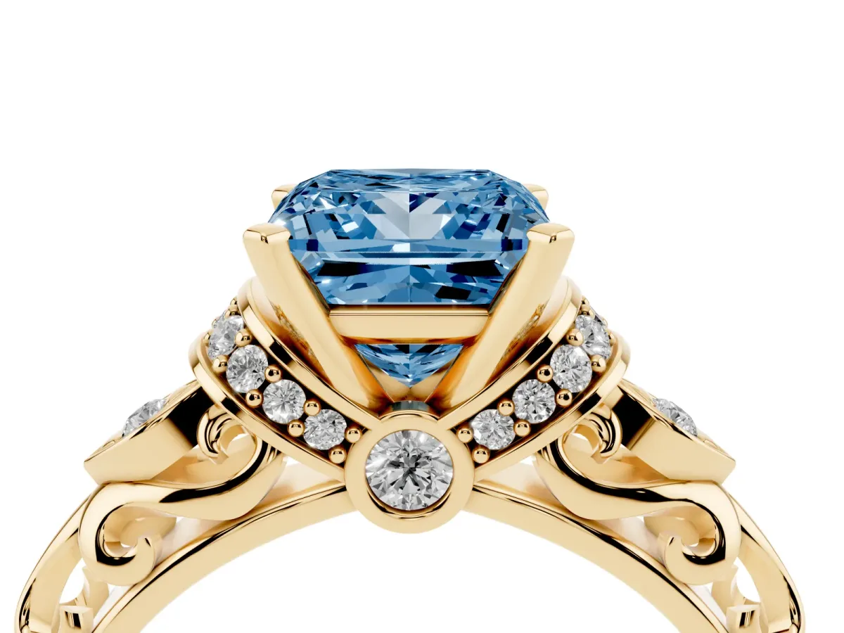 Fancy Blue Princess Cut Diamond Solitaire Ring with Filigree Band and Four-Prong Setting Yellow gold