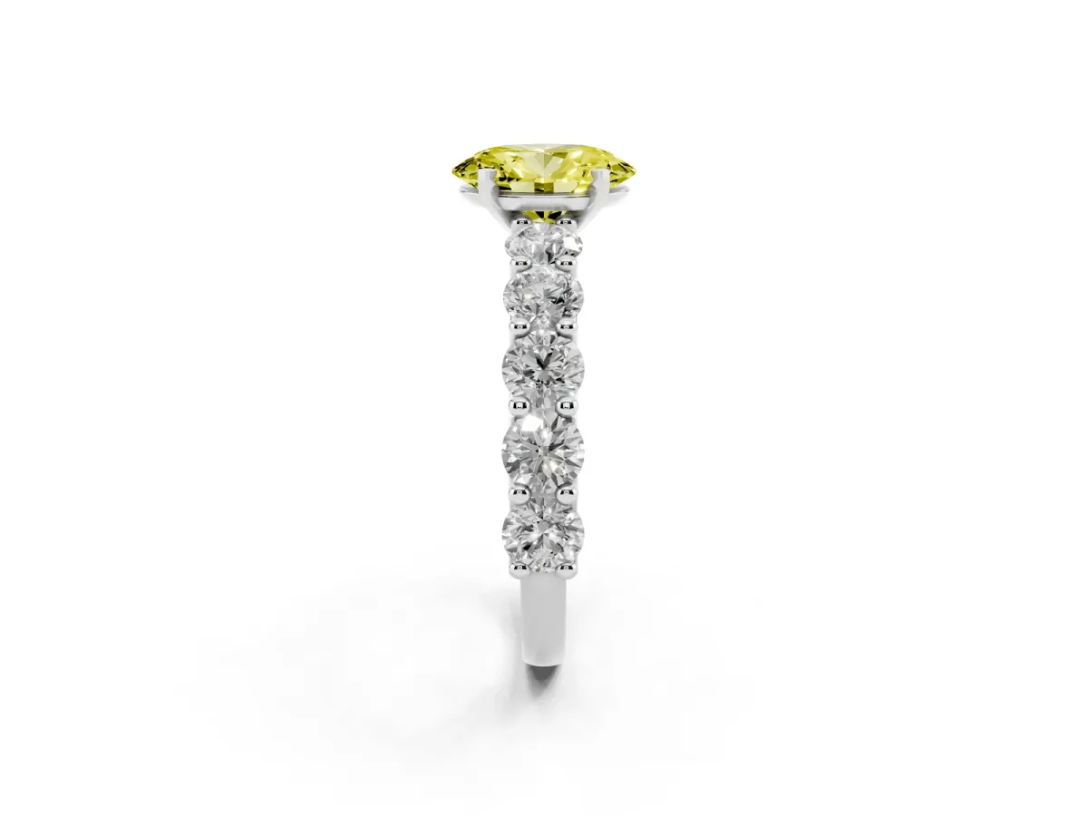 Fancy Yellow Oval Cut Diamond Prong Setting with Side Stones on a Pave Band Silver