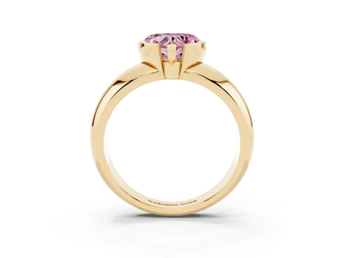 Fancy Pink Heart Cut Solitaire Tension Set Diamond Ring with Wide Band Yellow gold