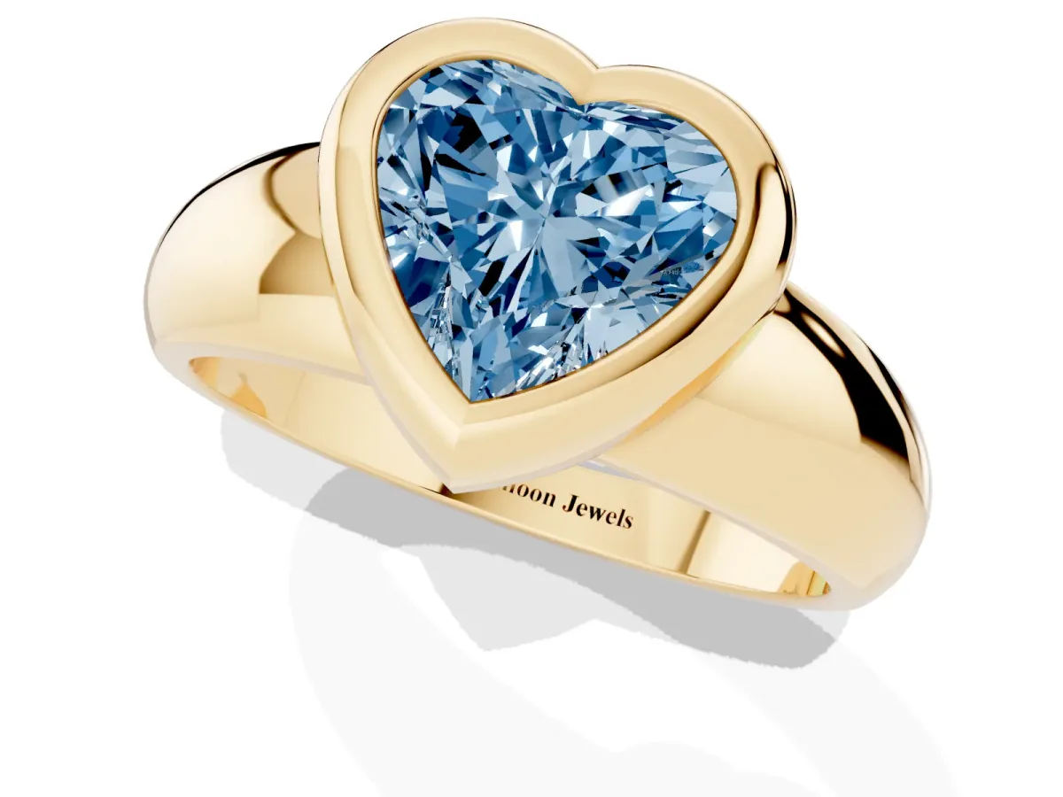 Fancy Blue Bezel Set Heart Cut Solitaire Ring with Wide Band Yellow gold