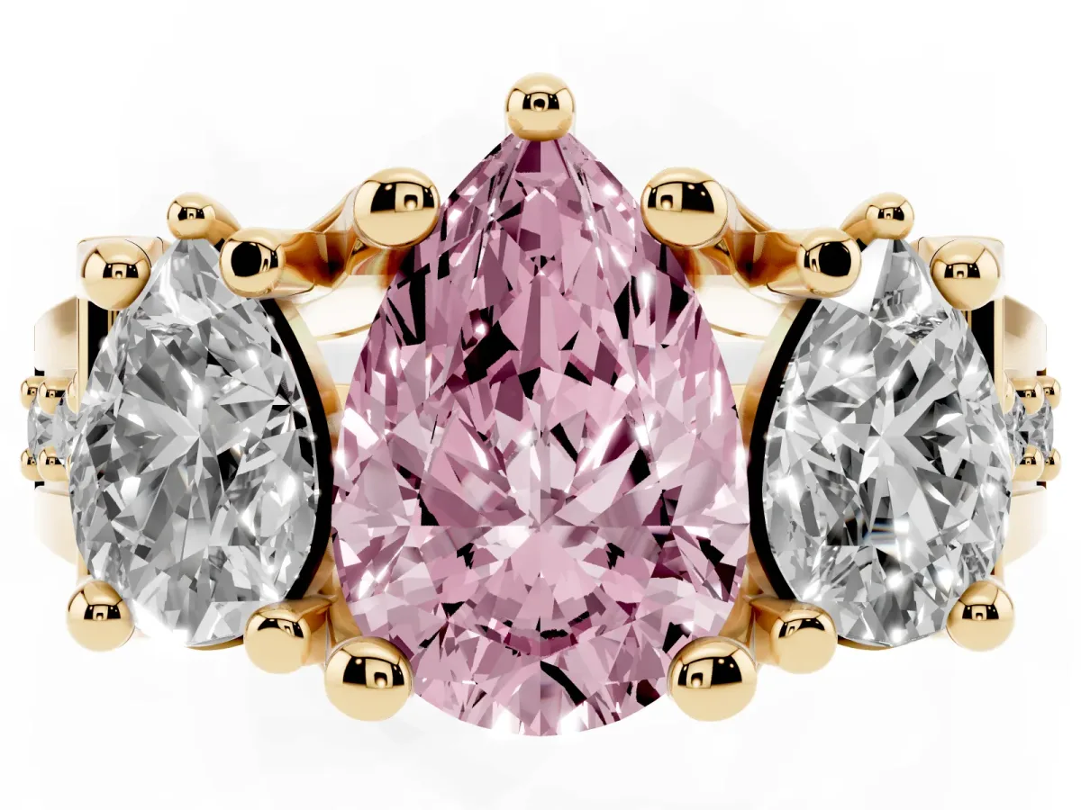 Fancy Pink Pear Cut Diamond Three-Stone Ring with Channel Set Band and Four-Prong Setting Yellow gold