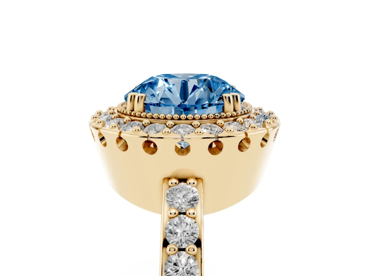 Fancy Blue Round Cut Diamond Halo Ring with Pavé Band and Prong Setting Yellow gold
