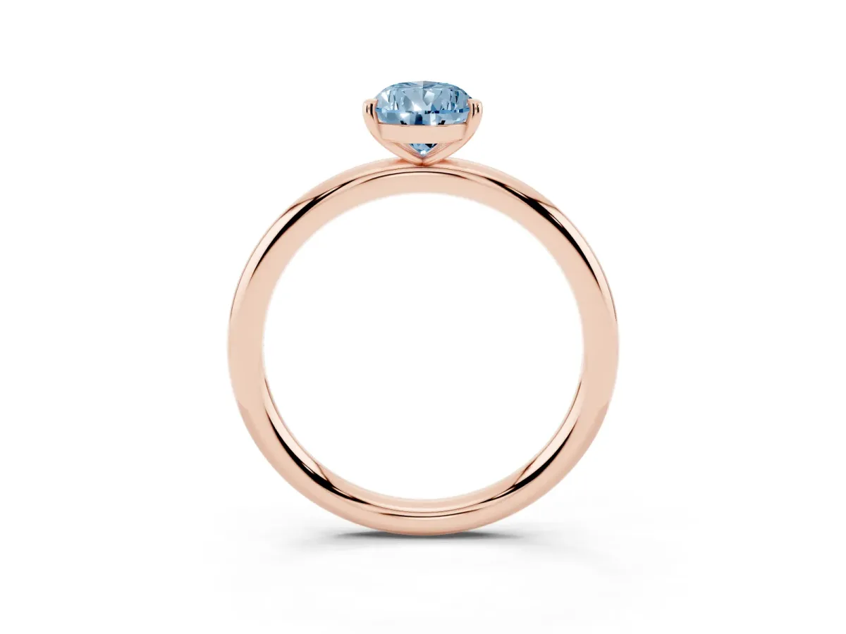 Fancy Blue Pear Cut Solitaire Diamond Ring with Four-Prong Setting on a Plain Band Rose gold