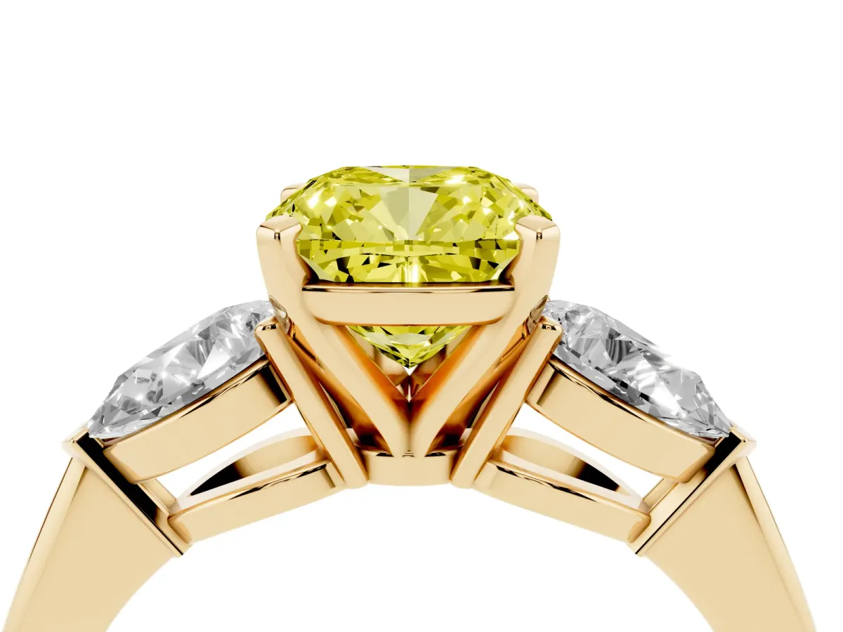 Fancy Yellow Three-Stone Cushion Cut Diamond Ring with Pear Side Stones and Four-Prong Setting Yellow gold