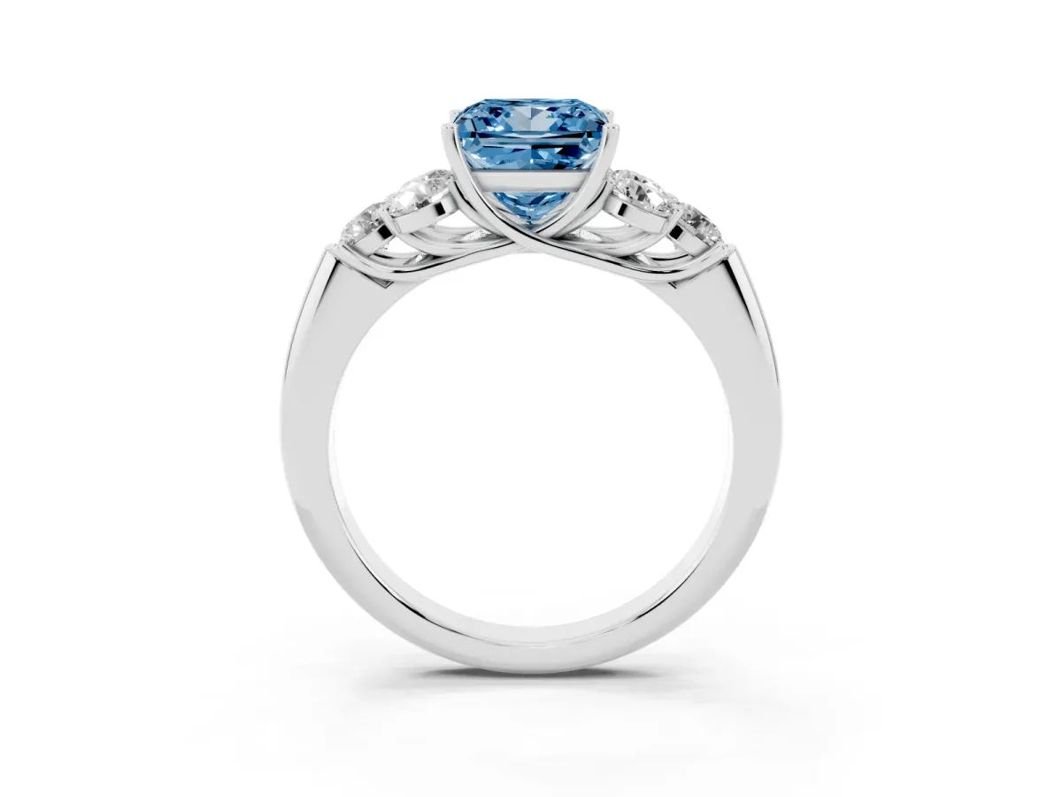 Fancy Blue Princess Cut Cut Diamond Cluster Ring with Round Accent Stones and Prong Setting on a Classic Band Silver