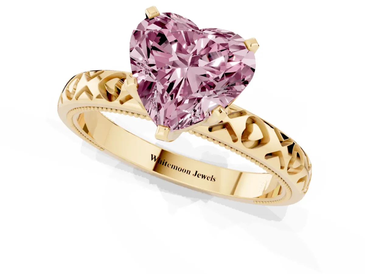Fancy Pink Heart Cut Solitaire Diamond Engagement Ring with XO Engraved Band and Four-Prong Setting Yellow gold
