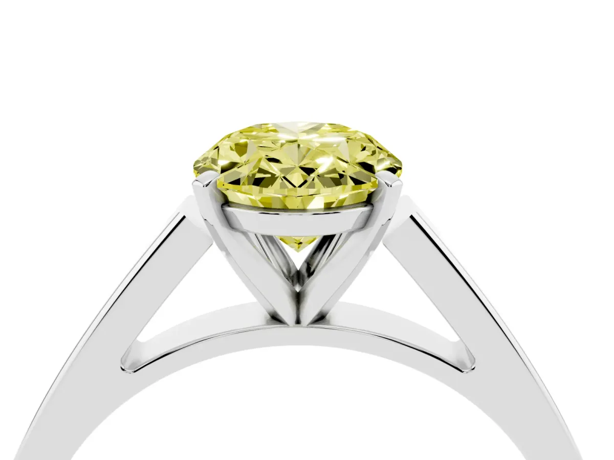 Fancy Yellow Oval Cut Solitaire Engagement Ring with Four-Prong Setting and Tapered Band Platinum