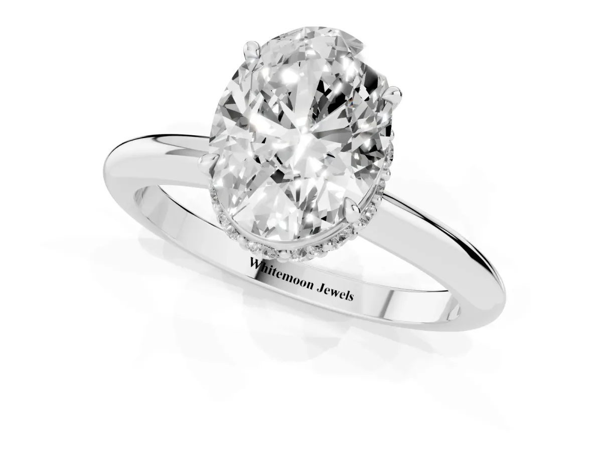 Oval Cut Brilliant Solitaire Engagement Ring with Six-Prong Setting and Classic Band White gold