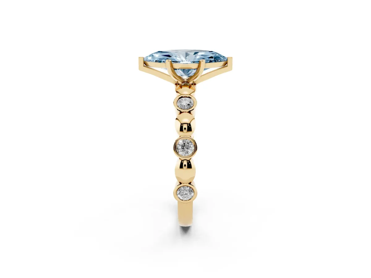 Fancy Blue Marquise Cut Solitaire Bezel-Set Diamond Ring with Beaded Band and Four-Prong Setting Yellow gold
