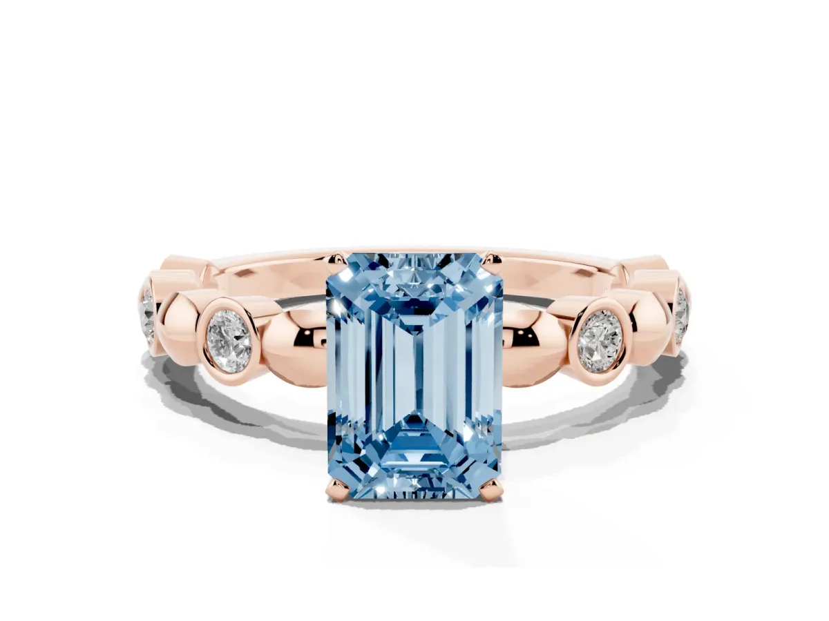 Fancy Blue Emerald Cut Solitaire Bezel-Set Diamond Ring with Beaded Band and Four-Prong Setting Rose gold