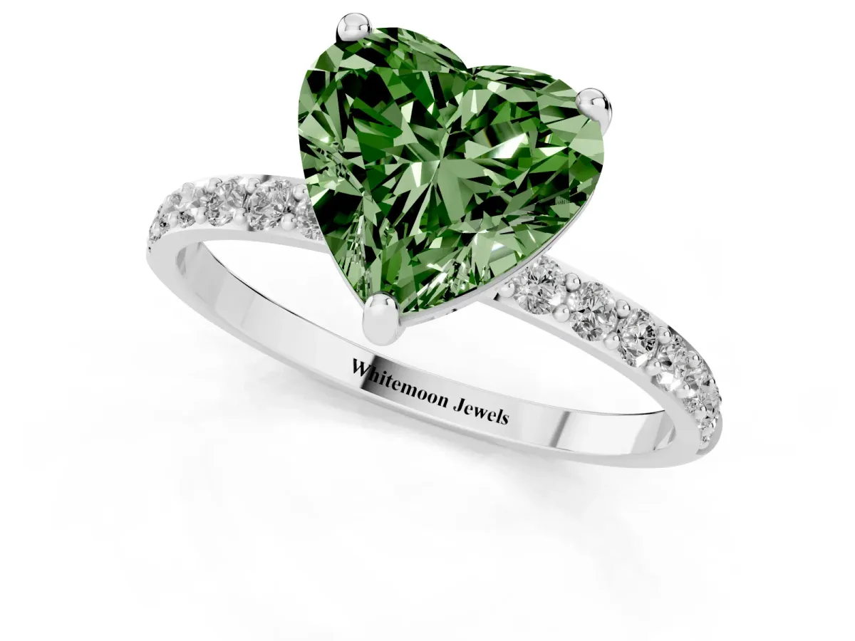 Fancy Green Heart Cut Diamond Solitaire Ring with Round Pavé Band and Prong Setting Silver