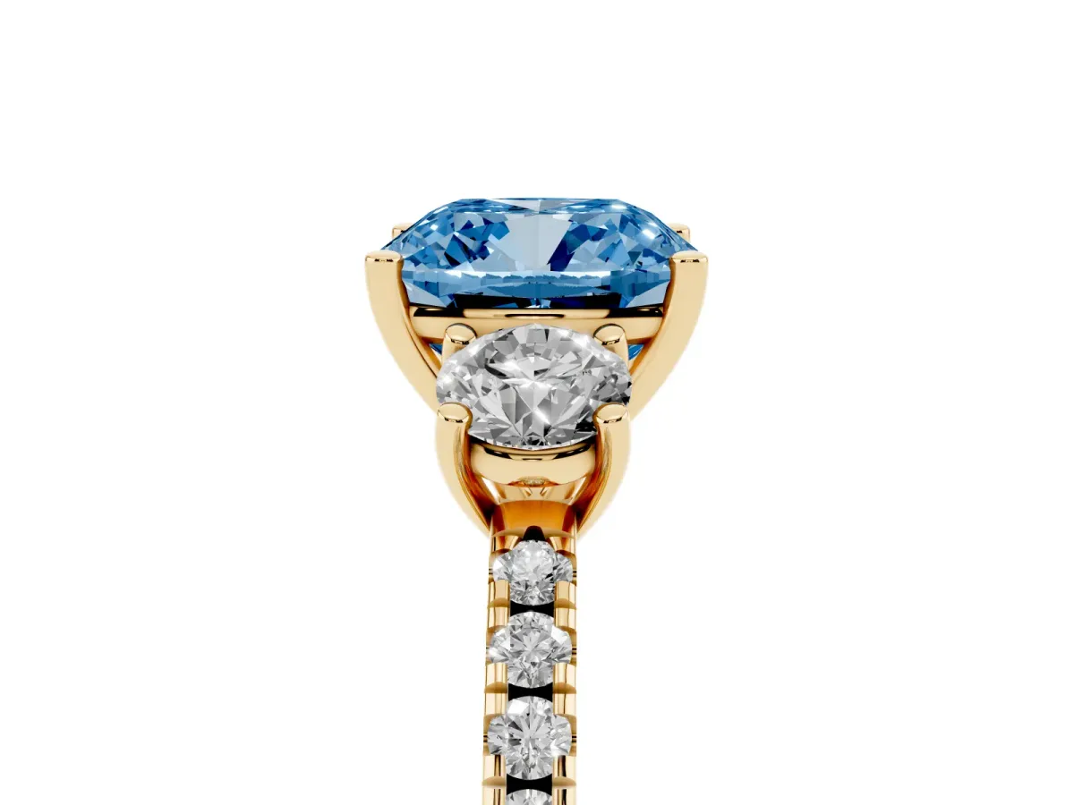 Fancy Blue Three-Stone Cushion Cut Cut Diamond Pavé Band with Prong Setting Yellow gold