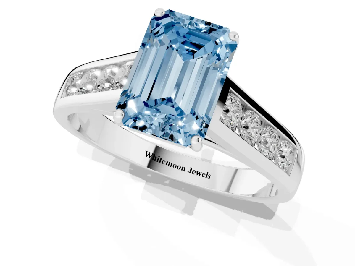 Fancy Blue Emerald Cut Solitaire Channel-Set Diamond Engagement Ring with Four-Prong Setting Silver