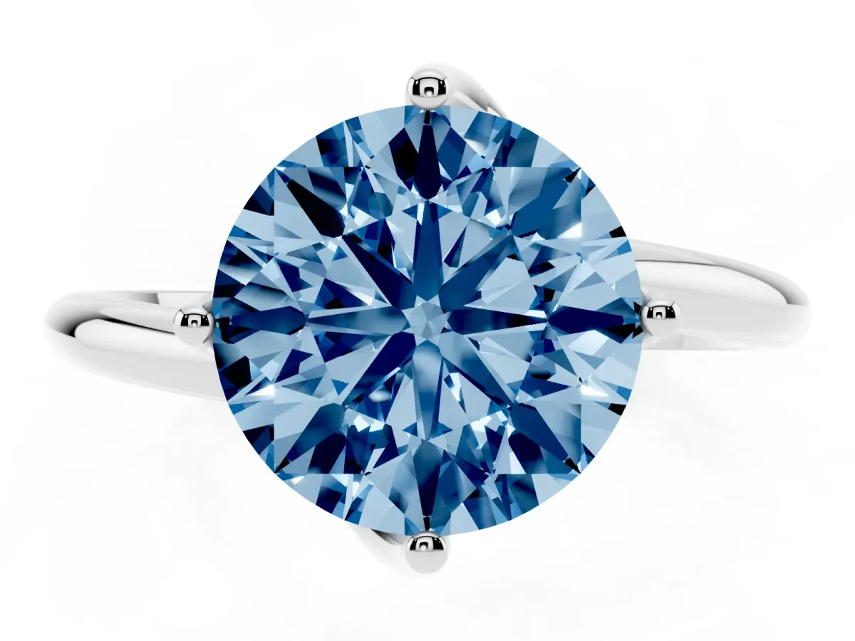 Fancy Blue Round Cut Diamond Solitaire Engagement Ring with Four-Prong Setting and Classic Band Silver