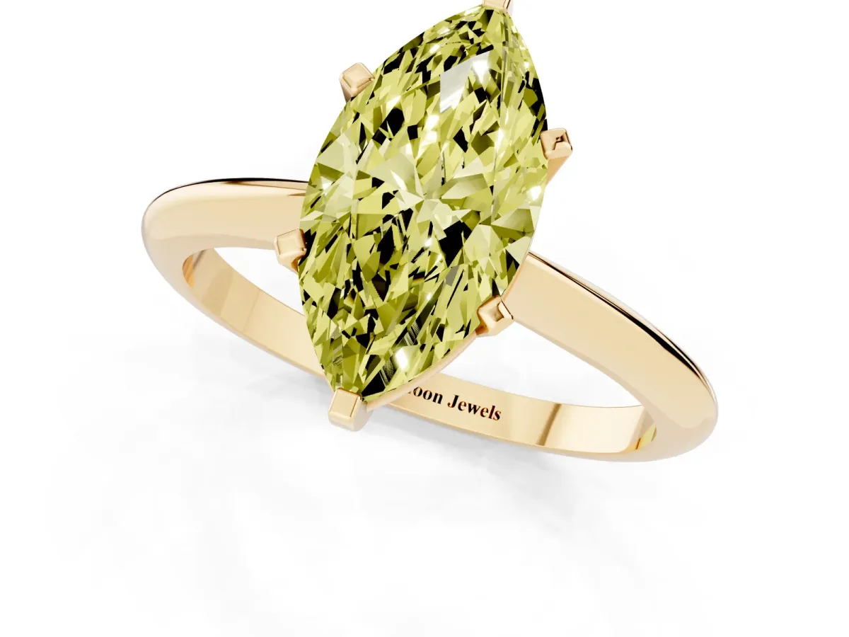 Fancy Yellow Marquise Cut Cut Solitaire Ring with Four-Prong Setting on a Classic Band Yellow gold