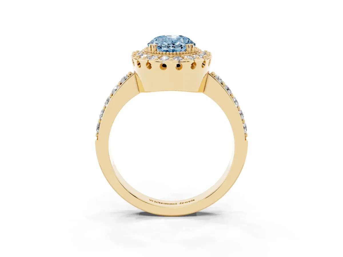 Fancy Blue Oval Cut Diamond Halo Ring with Pavé Band and Prong Setting Yellow gold