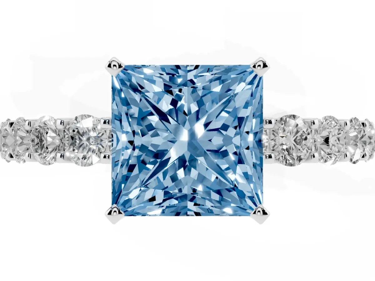 Fancy Blue Princess Cut Diamond Solitaire Ring with Shared Prong Pavé Band and Four-Prong Setting Silver