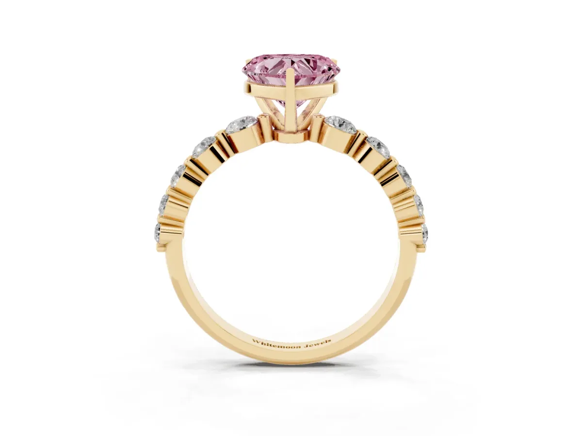 Fancy Pink Heart Cut Solitaire Diamond Ring with Pave Band and Four-Prong Setting Yellow gold