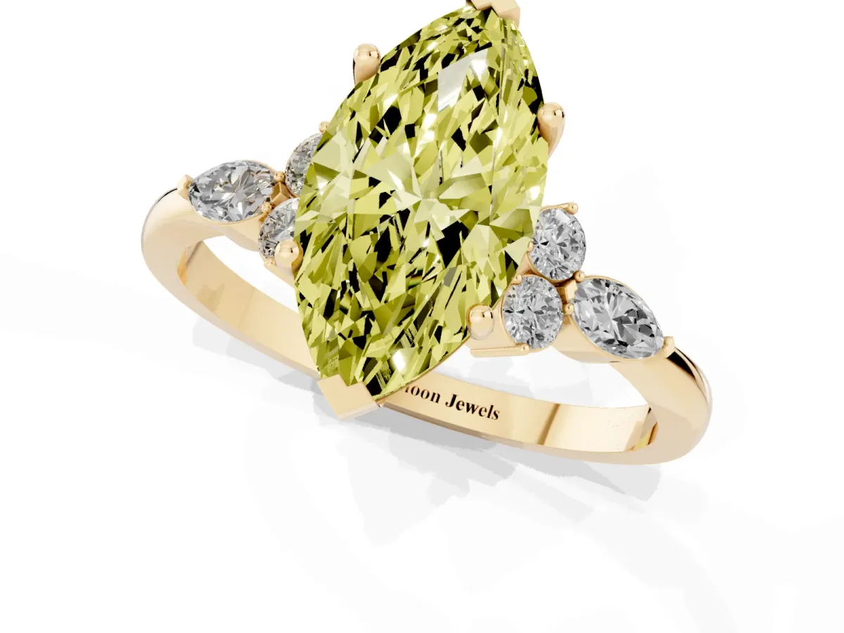 Fancy Yellow Marquise Cut Brilliant Diamond Solitaire Ring with Pear Side Stones and Four-Prong Setting Yellow gold