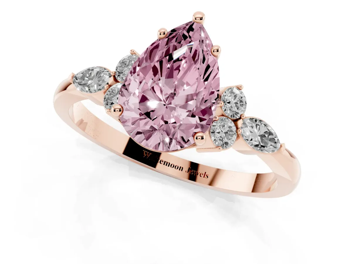 Fancy Pink Pear Cut Brilliant Diamond Solitaire Ring with Pear Side Stones and Four-Prong Setting Rose gold