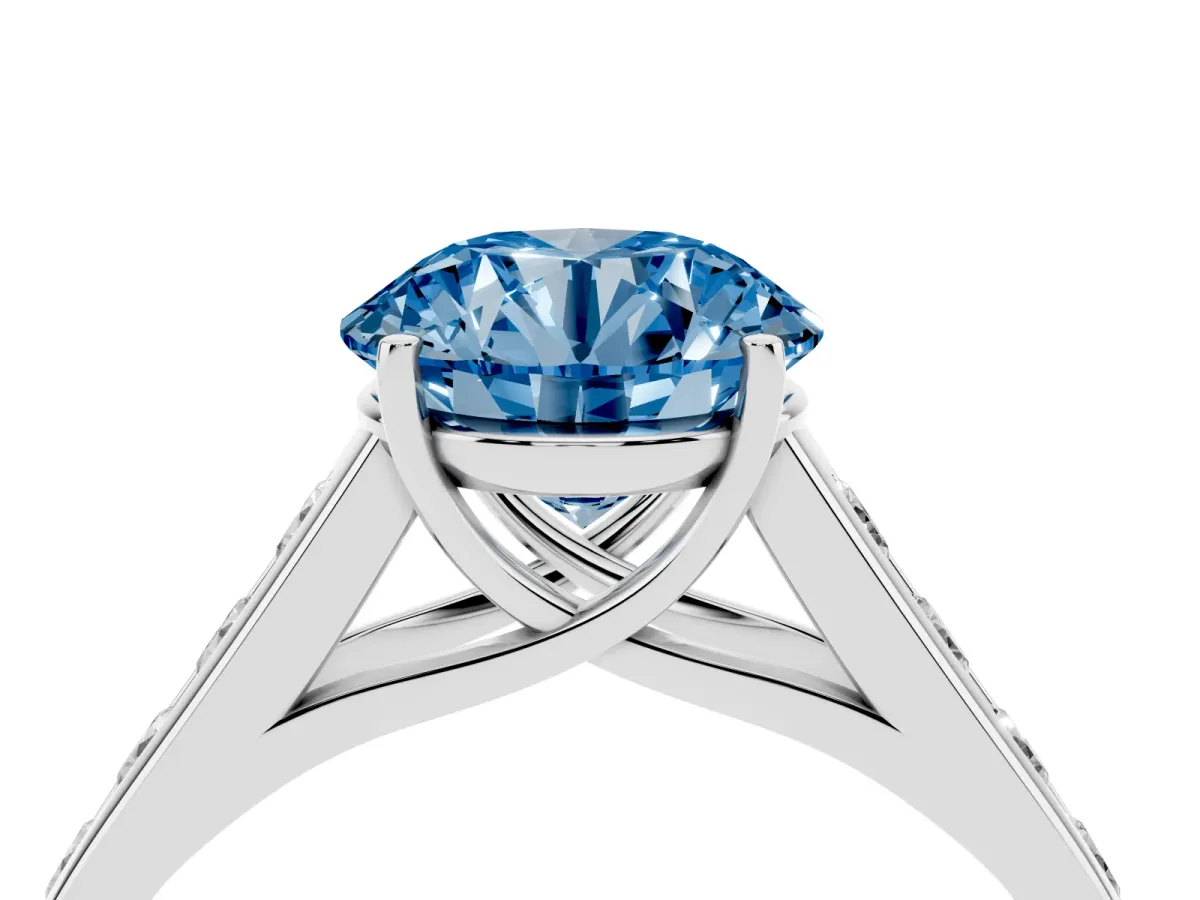 Fancy Blue Round Cut Solitaire Channel-Set Diamond Engagement Ring with Four-Prong Setting Silver