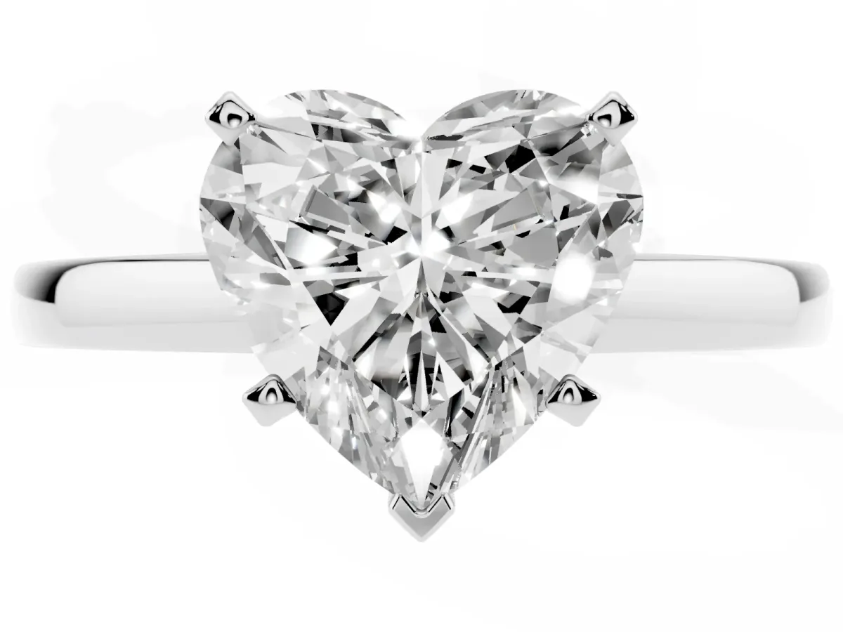 Heart Cut Solitaire Diamond Engagement Ring with Four-Prong Setting on a Classic Band Silver