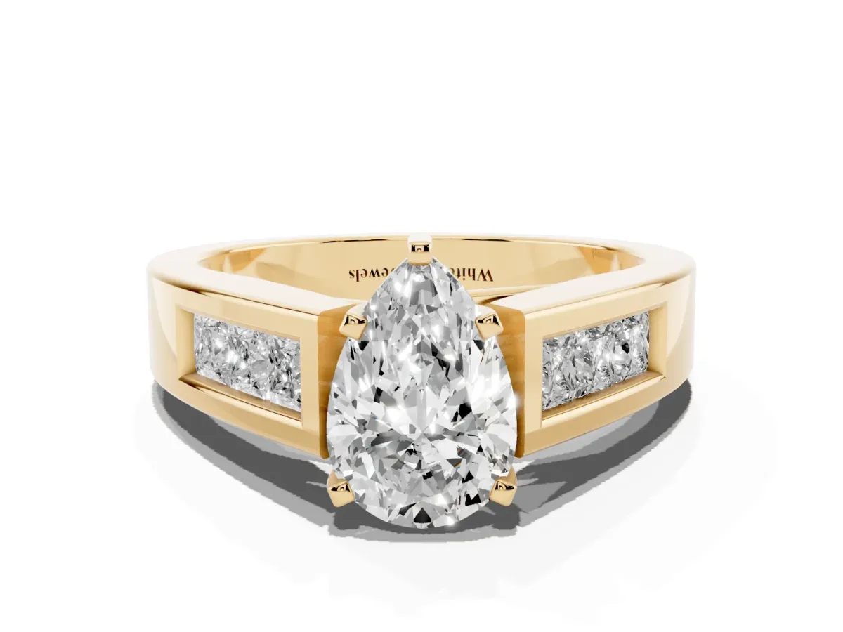 Pear Cut Cut Channel Set Solitaire Ring with Four-Prong Setting Yellow gold