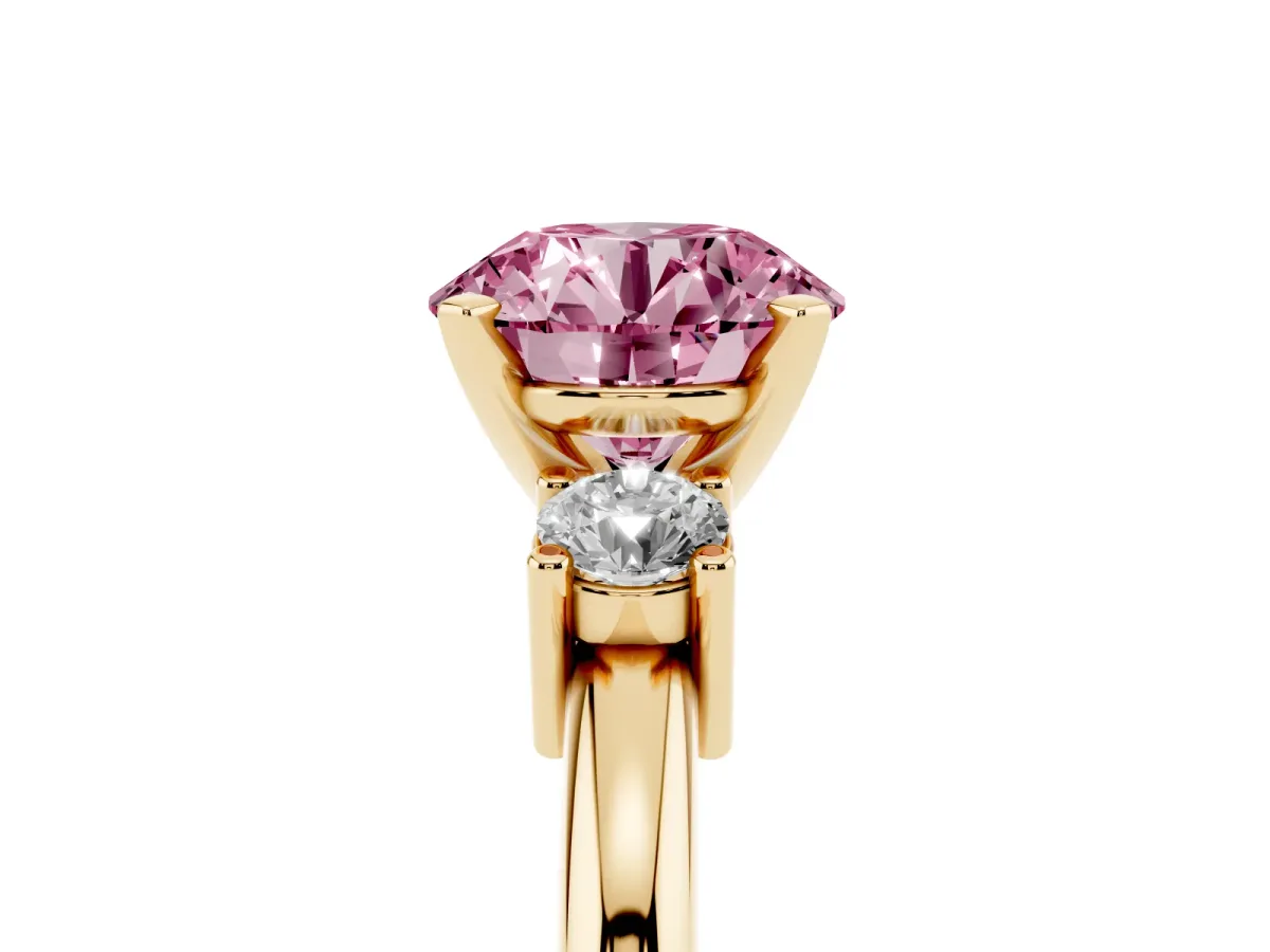 Fancy Pink Three-Stone Round Cut Cut Diamond Solitaire with Prong Setting and Classic Band Yellow gold