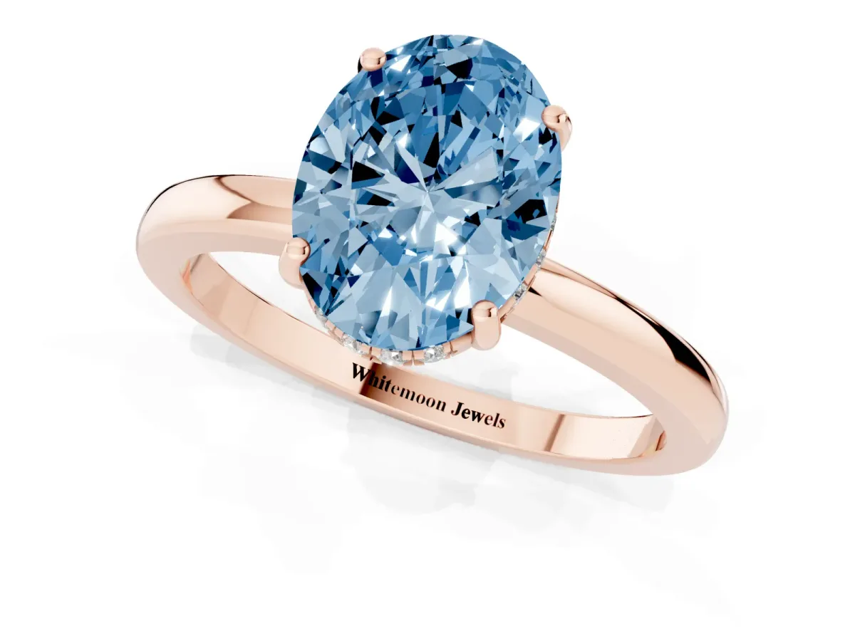 Fancy Blue Oval Cut Solitaire Diamond Ring with Prong Setting and Plain Band Rose gold