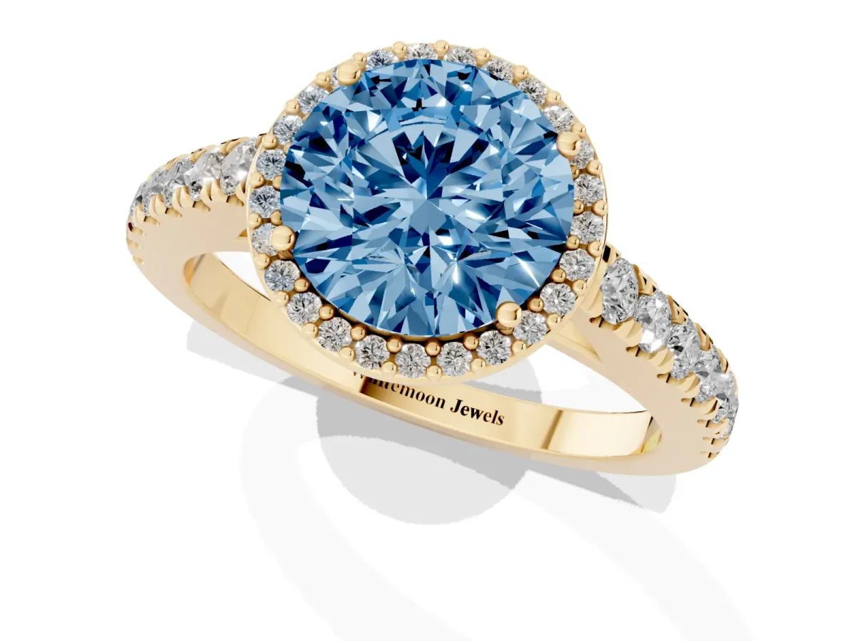 Fancy Blue Round Cut Cut Halo Diamond Engagement Ring with Pave Band and Four-Prong Setting Yellow gold