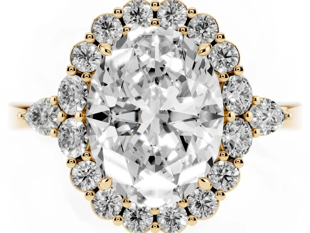 Oval Cut Diamond Halo Ring with Pear Side Stones and Prong Setting Yellow gold