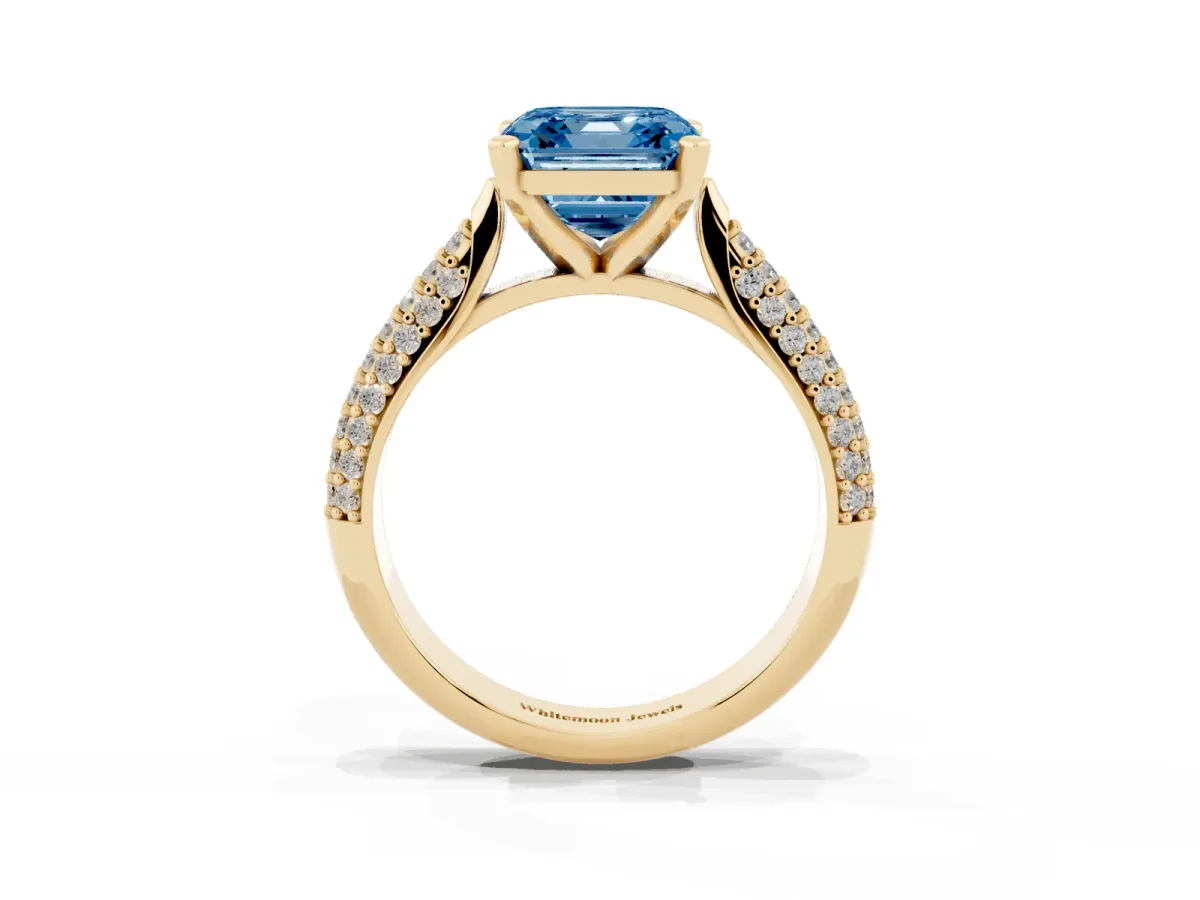 Fancy Blue Asscher Cut Diamond Solitaire Engagement Ring with Multi-Row Round Pavé Band and Prong Setting Yellow gold