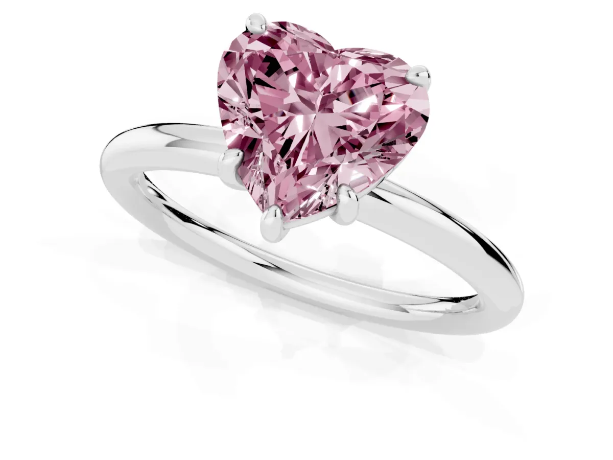 Fancy Pink Heart Cut Solitaire Diamond Ring with Four-Prong Setting on a Plain Band Platinum