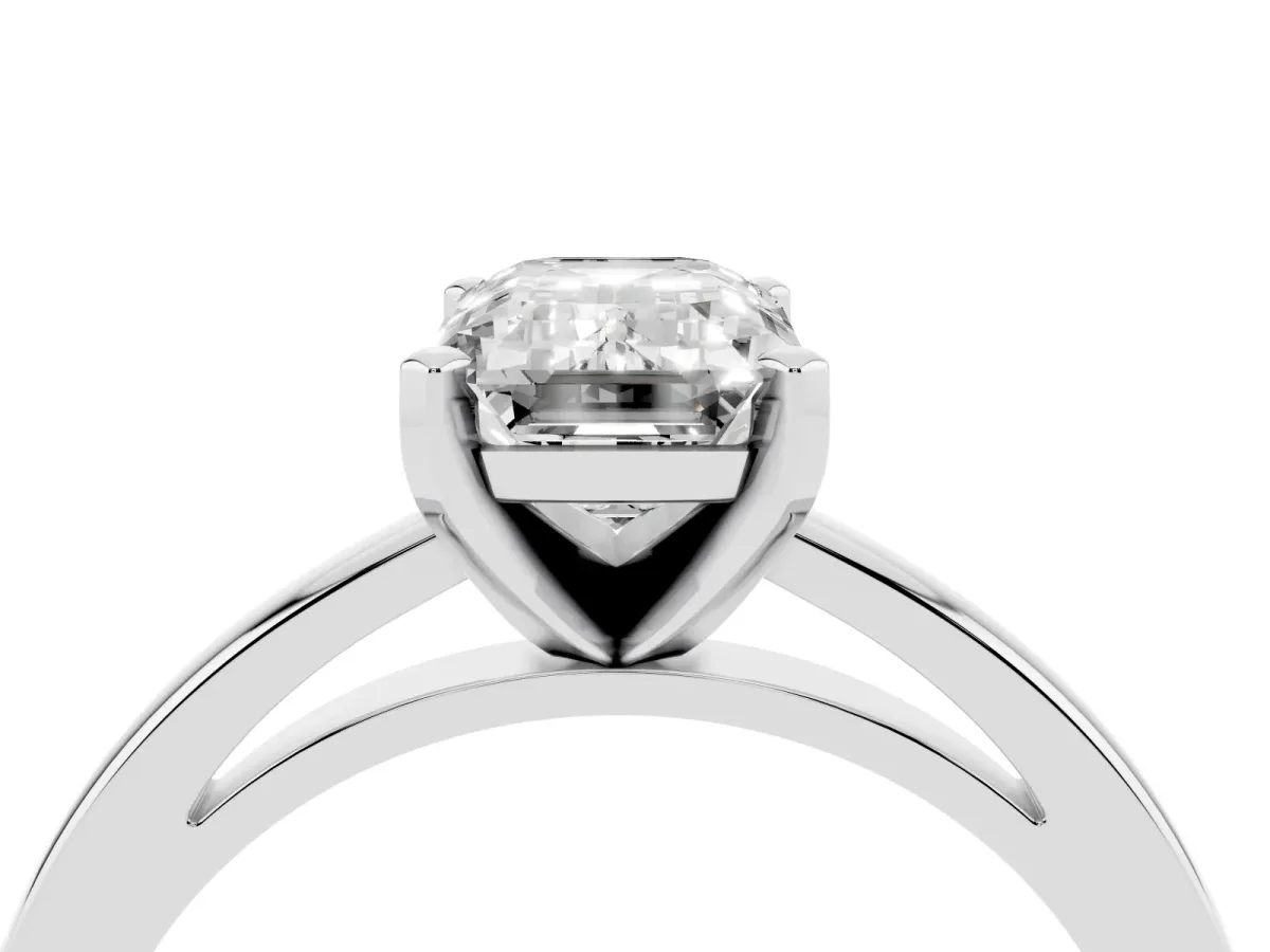 Emerald Cut Solitaire Diamond Engagement Ring with Four-Prong Setting on a Classic Band Silver