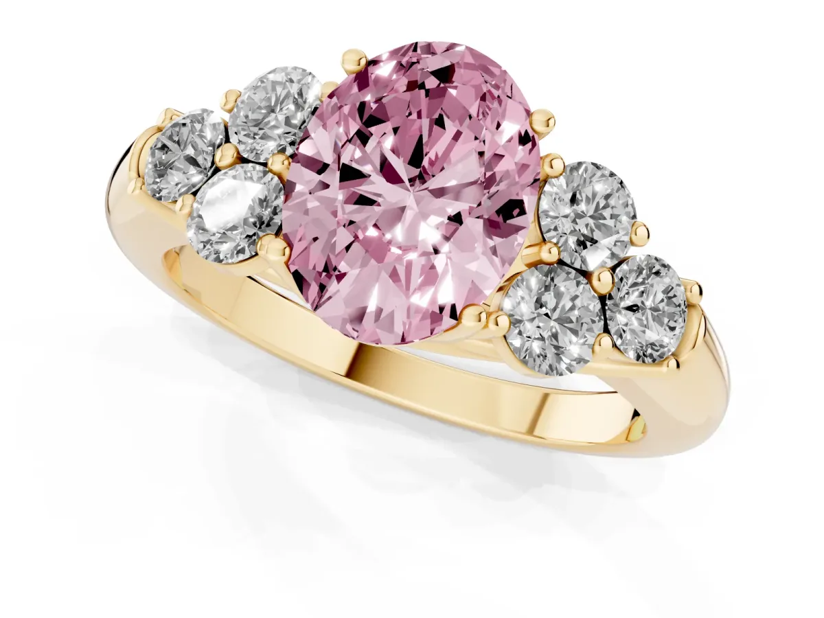 Fancy Pink Oval Cut Cut Diamond Cluster Ring with Round Accent Stones and Prong Setting on a Classic Band Yellow gold