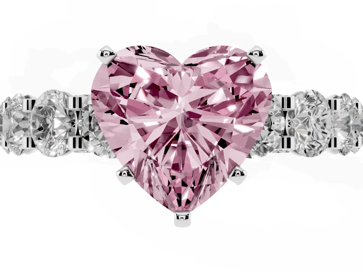 Fancy Pink Heart Cut Diamond Side Stone Engagement Ring with Four-Prong Setting Silver