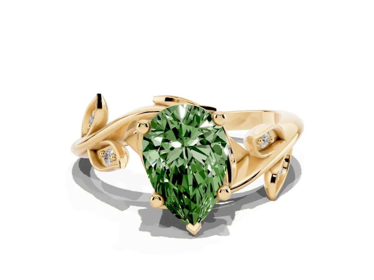 Fancy Green Pear Cut Solitaire Twist Engagement Ring with Leaf Accents and Prong Setting Yellow gold