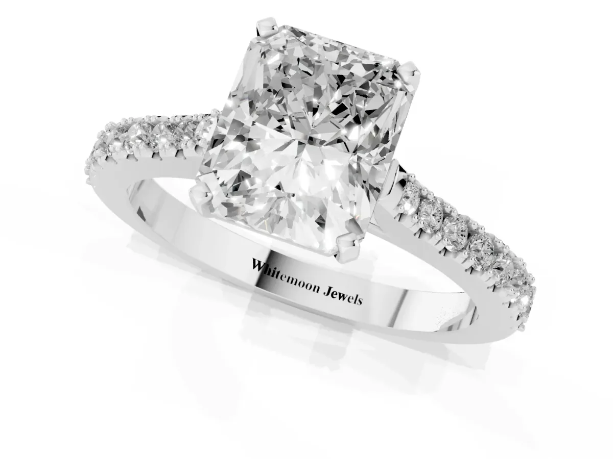 Radiant Cut Cut Solitaire Diamond Engagement Ring with Pave Band and Four-Prong Setting Platinum