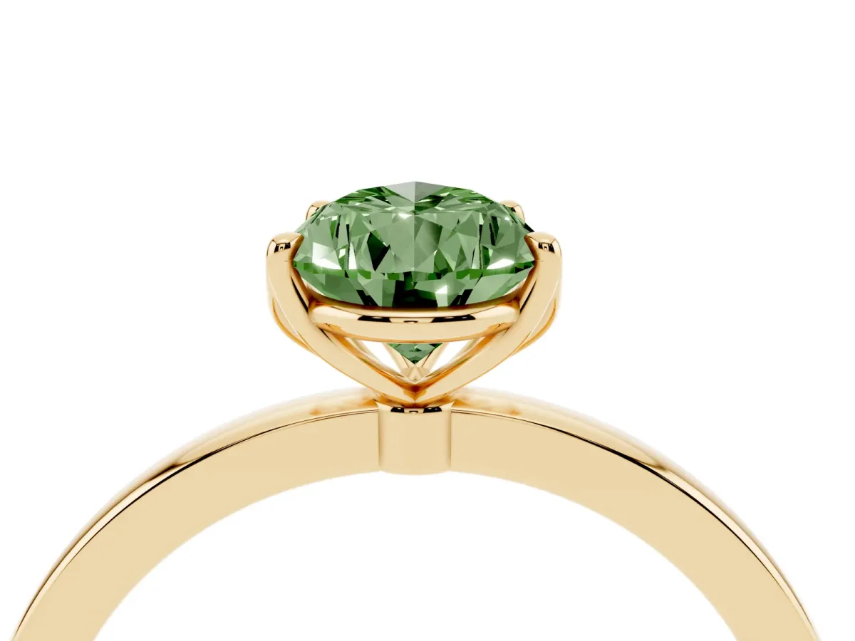 Fancy Green Pear Cut Diamond Solitaire Ring with Thin Band and Prong Setting Yellow gold