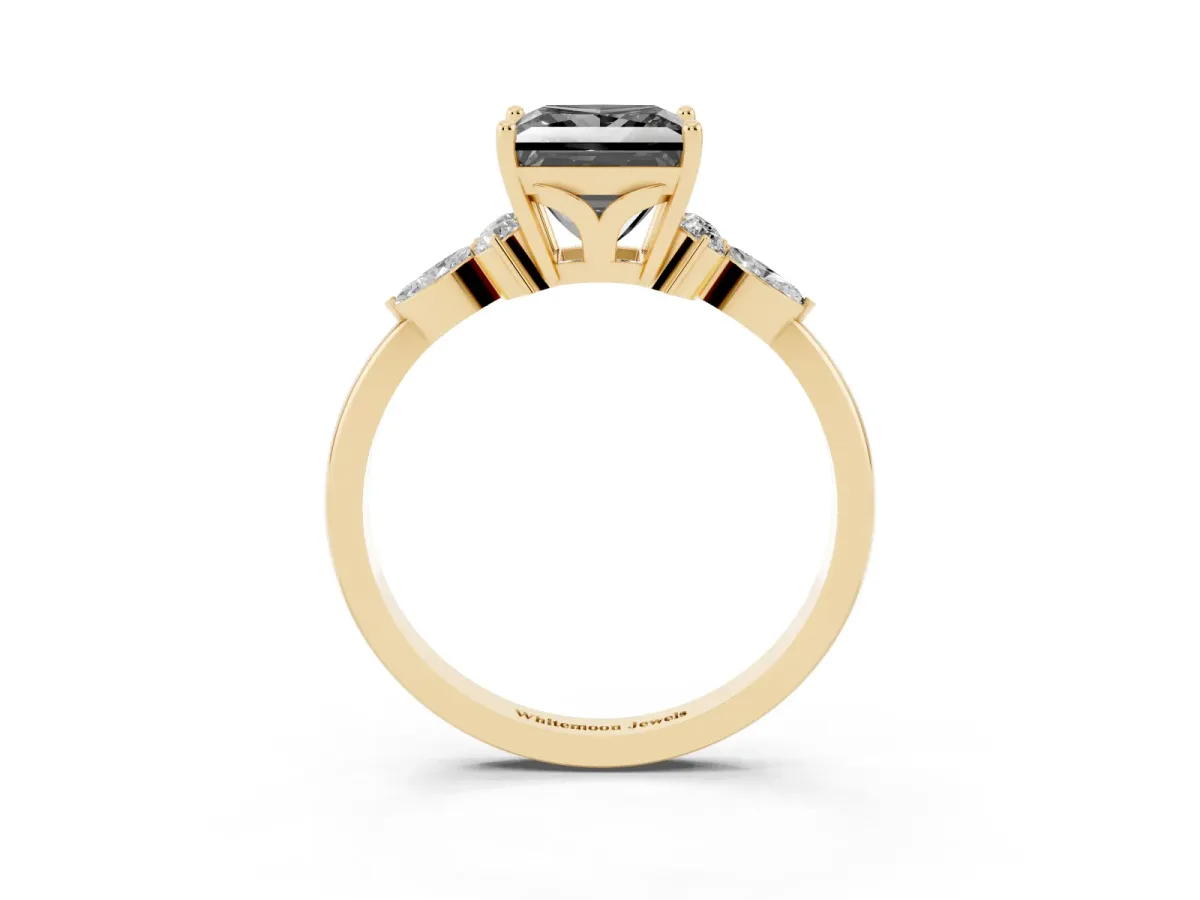 Fancy Black Princess Cut Brilliant Diamond Solitaire Ring with Pear Side Stones and Four-Prong Setting Yellow gold