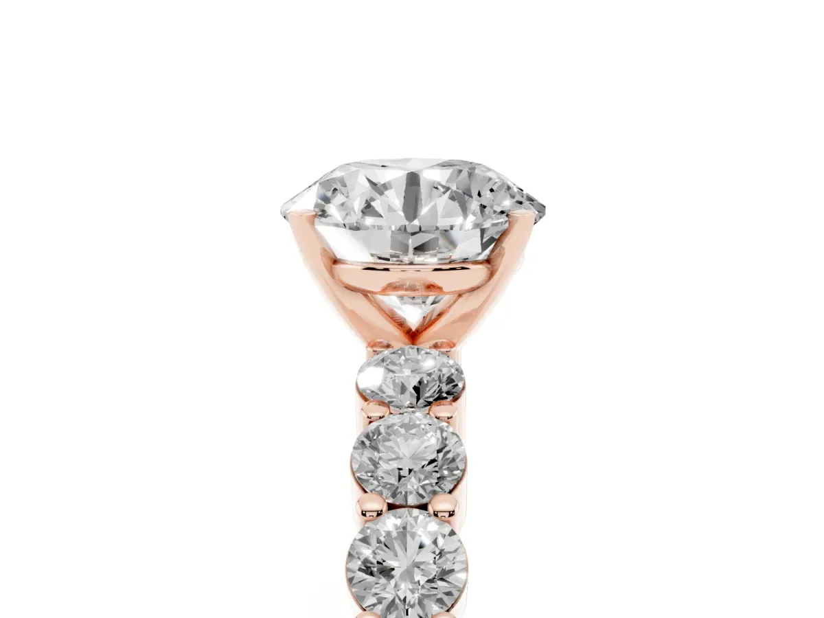Round Cut Diamond Solitaire Ring with Shared Prong Round Side Stones Rose gold