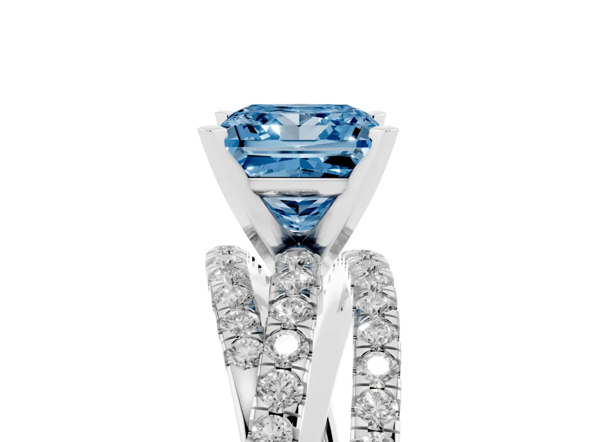 Fancy Blue Princess Cut Solitaire Twist Band with Pavé Setting and Four-Prong Setting Silver