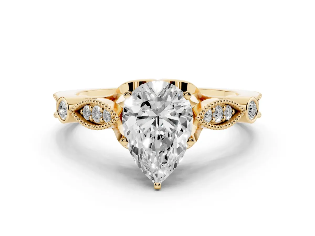 Pear Cut Cut Diamond with Milgrain Marquise and Bezel Accents on a Solitaire Band with Prong Setting Yellow gold