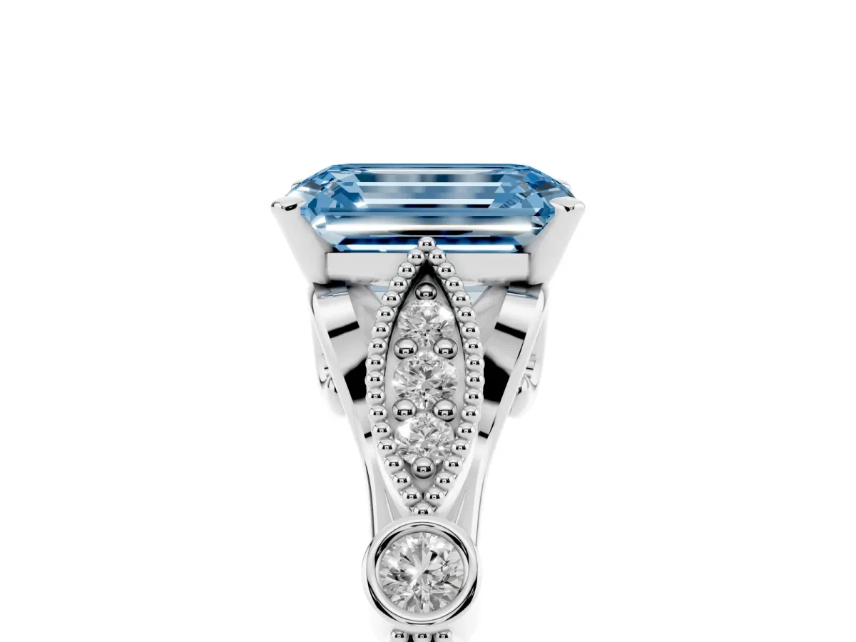 Fancy Blue Emerald Cut Cut Diamond with Milgrain Marquise and Bezel Accents on a Solitaire Band with Prong Setting Silver