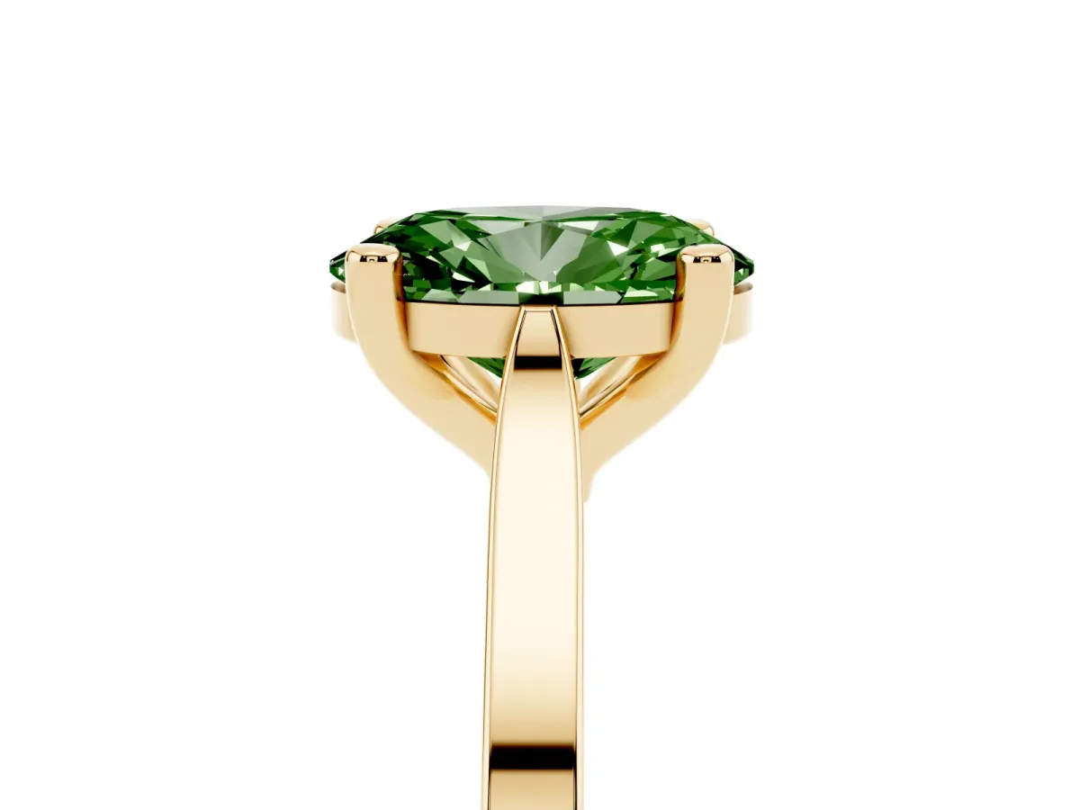 Fancy Green Oval Cut Solitaire Diamond Ring with Four-Prong Setting and Tapered Band Yellow gold