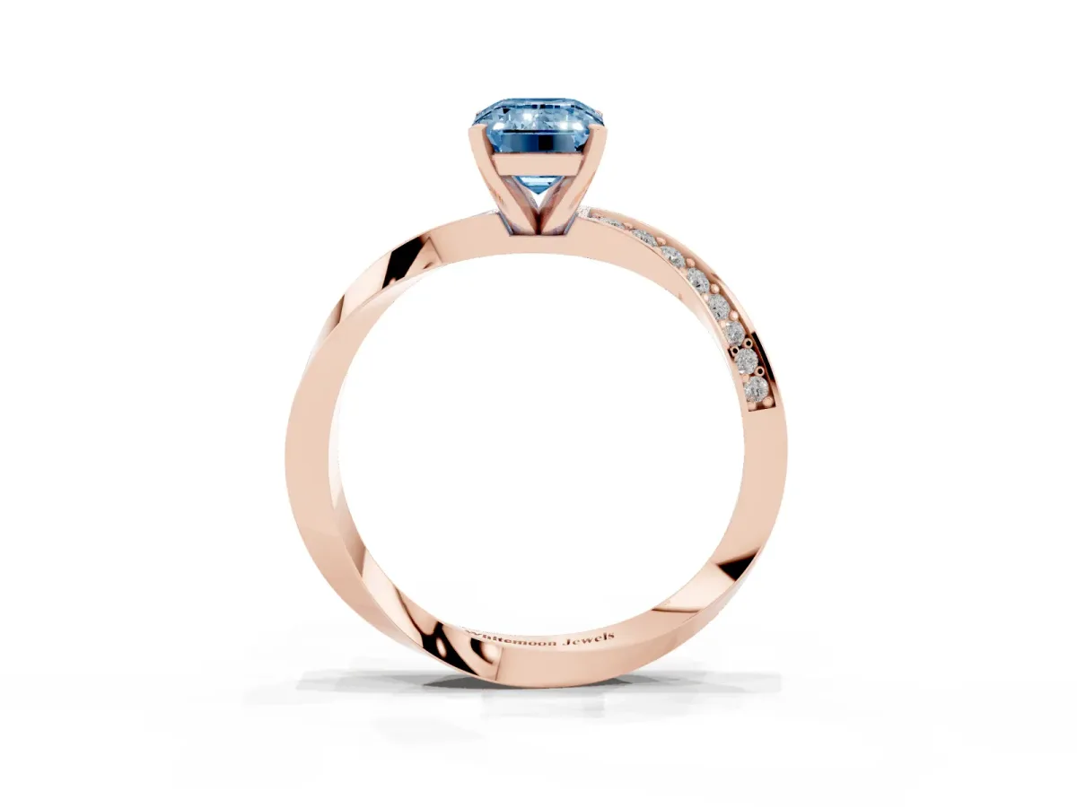 Fancy Blue Emerald Cut Diamond Engagement Ring with Side Stone Accents and Four-Prong Setting Rose gold
