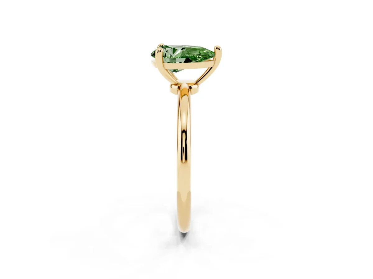 Fancy Green Pear Cut Solitaire Diamond Ring with 4-Prong Setting on a Classic Band Yellow gold