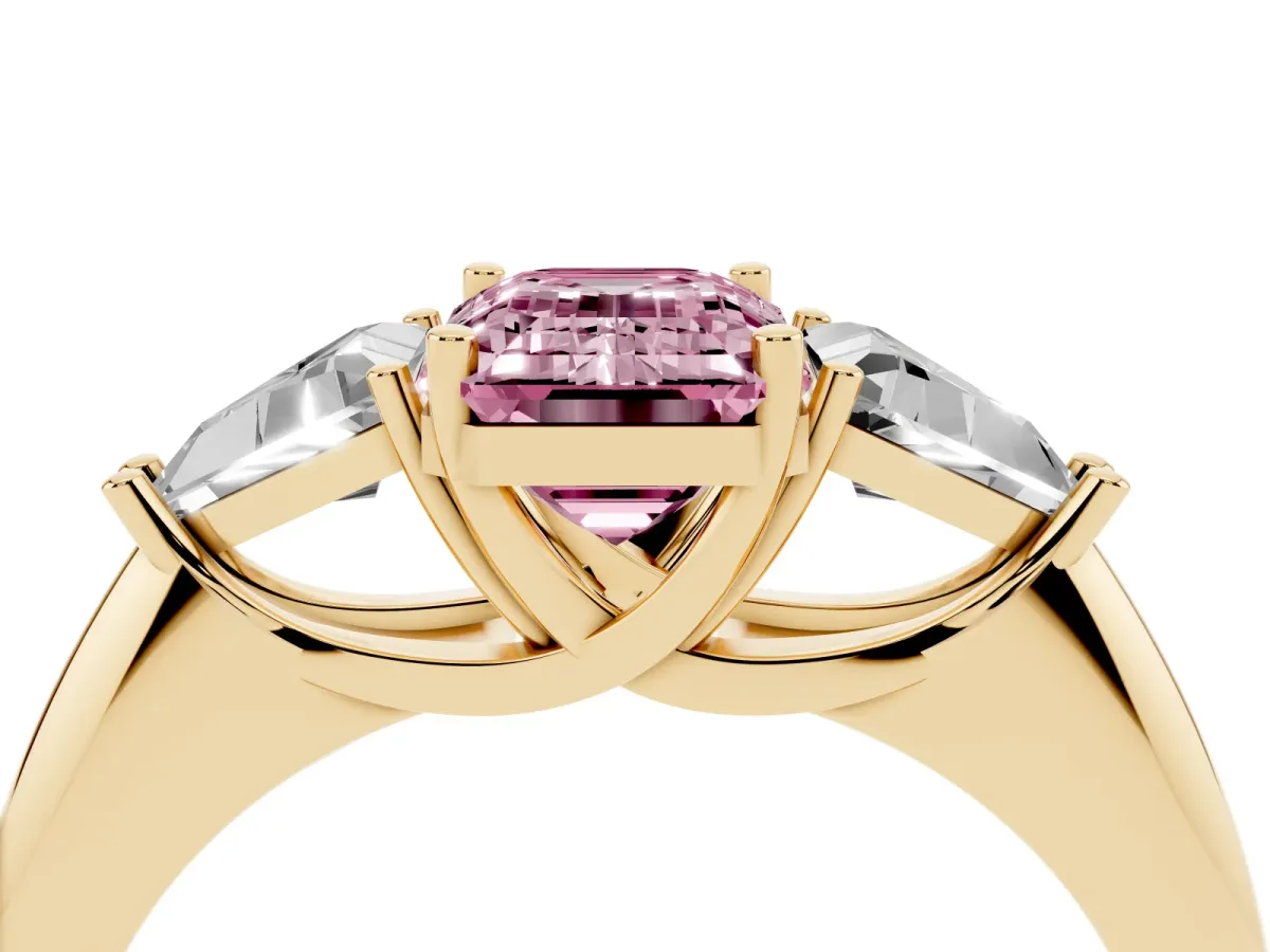 Fancy Pink Three-Stone Emerald Cut Diamond Engagement Ring with Trillion Side Stones and Prong Setting Yellow gold